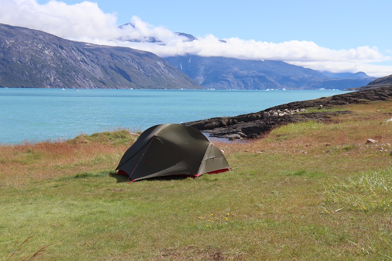 Naše miesto na stan s výhľadom na Tunulliarfik fjord